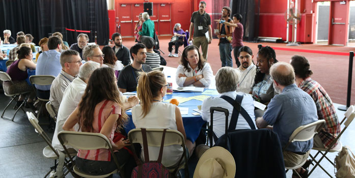 Group at CommonBound 2014 sitting around the table engaging in coversation